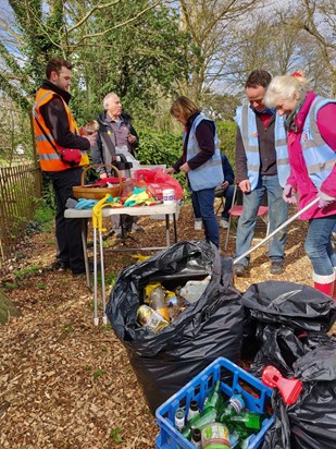 Volunteers cleaning up rubbish